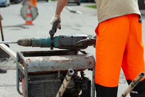 man using tools